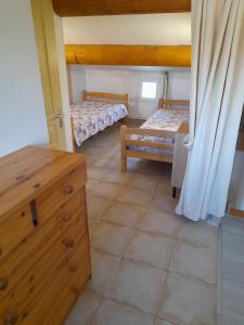 Postel nebo postele na pokoji v ubytování Chambres d'Hôtes Chez Cécile à Lagnes