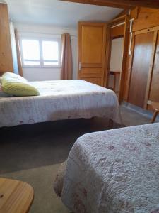 Postel nebo postele na pokoji v ubytování Chambres d'Hôtes Chez Cécile à Lagnes