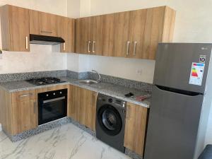 Kuchyň nebo kuchyňský kout v ubytování Zenata Tower