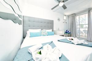 Postel nebo postele na pokoji v ubytování Suite Infinity Ocean - sea view