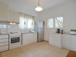 A kitchen or kitchenette at Villa Hera