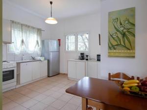 A kitchen or kitchenette at Villa Hera