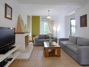 A television and/or entertainment centre at Villa Hera