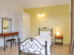 A bed or beds in a room at Villa Hera