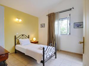 A bed or beds in a room at Villa Hera