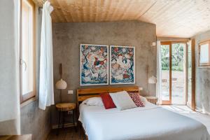 Ένα ή περισσότερα κρεβάτια σε δωμάτιο στο Casa Viva
