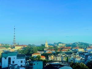 a view of a city with houses and buildings at Anh Hào Hotel in Da Lat