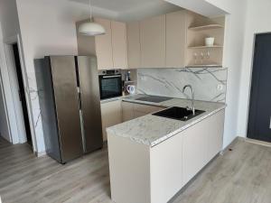 Kuchyňa alebo kuchynka v ubytovaní Eva Apartment 2