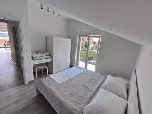 Posteľ alebo postele v izbe v ubytovaní Eva Apartment 2