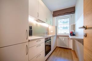 Kuchyň nebo kuchyňský kout v ubytování Apartment Brunelle