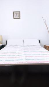 Een bed of bedden in een kamer bij Villa Maria (3)
