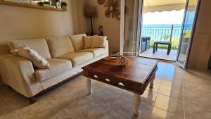Ein Sitzbereich in der Unterkunft BeachHouse