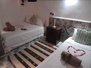Letto o letti in una camera di Riad Wink