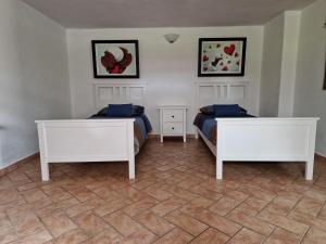 Кровать или кровати в номере Sant'Anselmo
