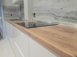 Kuchyň nebo kuchyňský kout v ubytování Graf Apartnents1 + 9 fotografií