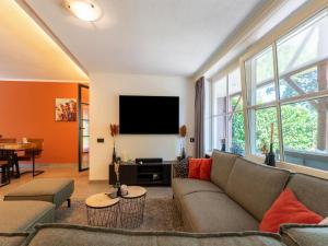 TV a/nebo společenská místnost v ubytování Eibergen Holiday Retreat Home