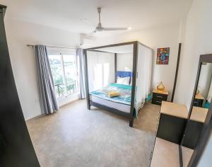 a bedroom with a mirror and a bed in it at Royal Home Luxor Nile View in Luxor +30 photos