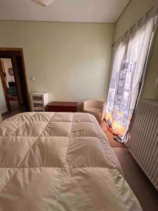 Postel nebo postele na pokoji v ubytování Beautiful and comfortable apartment by the sea