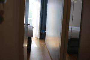 Postel nebo postele na pokoji v ubytování Mint Apartment