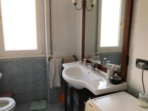 a bathroom with a sink and a toilet at Vaticano in Rome