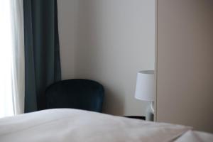 Postel nebo postele na pokoji v ubytování Mint Apartment