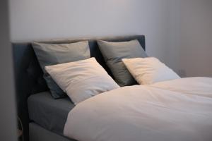 Postel nebo postele na pokoji v ubytování Mint Apartment