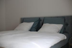 Postel nebo postele na pokoji v ubytování Mint Apartment