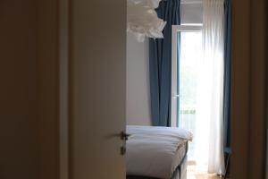 Postel nebo postele na pokoji v ubytování Mint Apartment