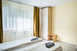 Un pat sau paturi într-o cameră la Apartment Yana