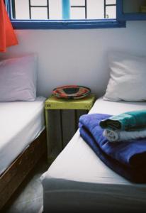 Postel nebo postele na pokoji v ubytování Onda Surf