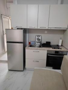 Kuchyň nebo kuchyňský kout v ubytování M2 - Maraki Apartments