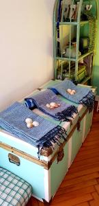 Ein Bett oder Betten in einem Zimmer der Unterkunft La casetta delle rondini