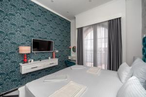 TV a/nebo společenská místnost v ubytování Baba's Hotel & Spa