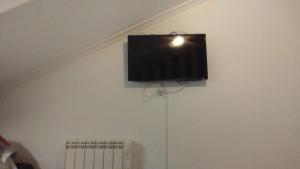 TV a/nebo společenská místnost v ubytování Apartamento Atico Altar