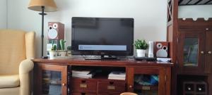 TV a/nebo společenská místnost v ubytování Apartamento Atico Altar