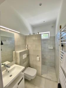 Koupelna v ubytování Luca Apartman