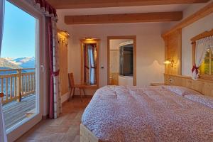 Postel nebo postele na pokoji v ubytování Albergo San Rocco
