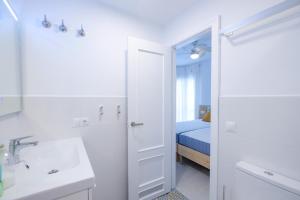 Posteľ alebo postele v izbe v ubytovaní LOFT2STAY.COM