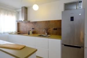 Kuchyňa alebo kuchynka v ubytovaní LOFT2STAY.COM
