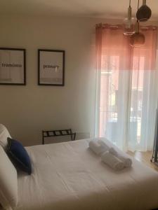 Krevet ili kreveti u jedinici u okviru objekta Tuscany Suites Firenze Belfiore