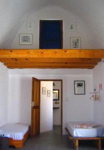 Ένα ή περισσότερα κρεβάτια σε δωμάτιο στο Alternative Space B & B