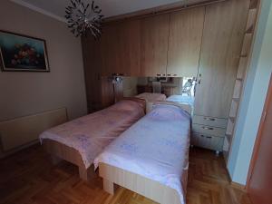 Postel nebo postele na pokoji v ubytování Apartman Hana