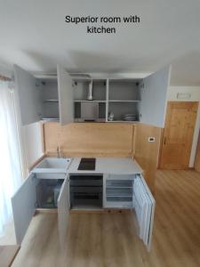 Kuchyň nebo kuchyňský kout v ubytování Albergo San Rocco