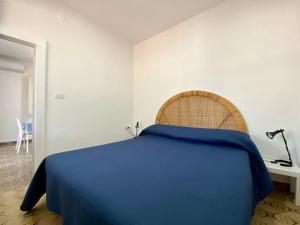 En eller flere senge i et værelse på Villetta Pasquina