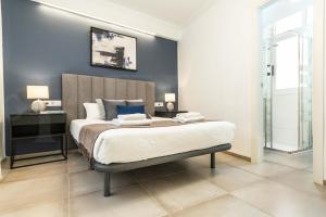 Posteľ alebo postele v izbe v ubytovaní Serene & spacious apartment - Center by REMS