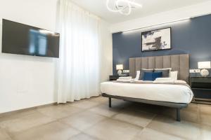 Posteľ alebo postele v izbe v ubytovaní Serene & spacious apartment - Center by REMS