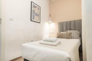 Posteľ alebo postele v izbe v ubytovaní Serene & spacious apartment - Center by REMS