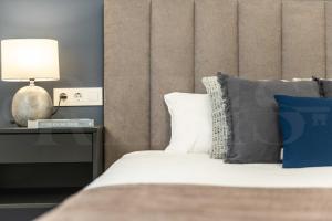 Posteľ alebo postele v izbe v ubytovaní Serene & spacious apartment - Center by REMS