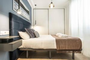 Posteľ alebo postele v izbe v ubytovaní Serene & spacious apartment - Center by REMS