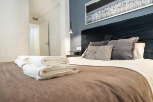 Posteľ alebo postele v izbe v ubytovaní Serene & spacious apartment - Center by REMS